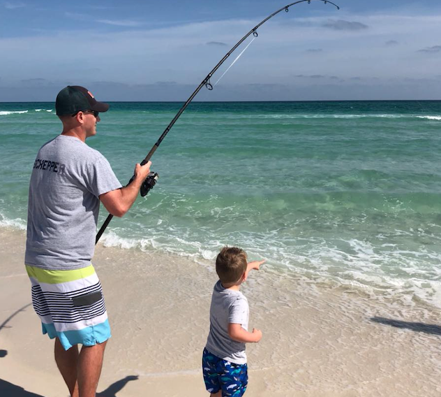 Father And Son Fishing On Pensacola Beach