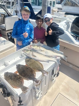 Flounder, Striped Bass Fishing in Hampton Bays, New York