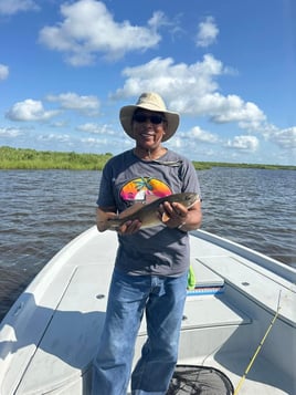 “Marsh Treasures: Redfish, Trout, and Bayou Thrills”  Sport