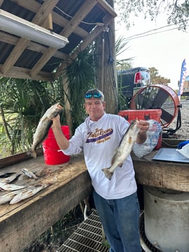 “Marsh Treasures: Redfish, Trout, and Bayou Thrills”  Sport