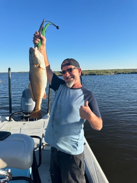 “Marsh Treasures: Redfish, Trout, and Bayou Thrills”  Sport