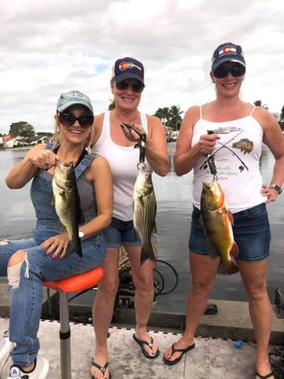 Hybrid Striped Bass, Largemouth Bass, Peacock Bass Fishing in Delray Beach, Florida